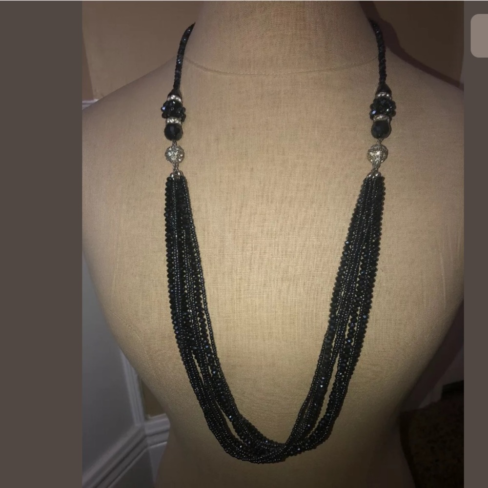 Multi stand black necklace layered